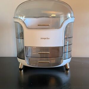 Storage box/cosmetic container